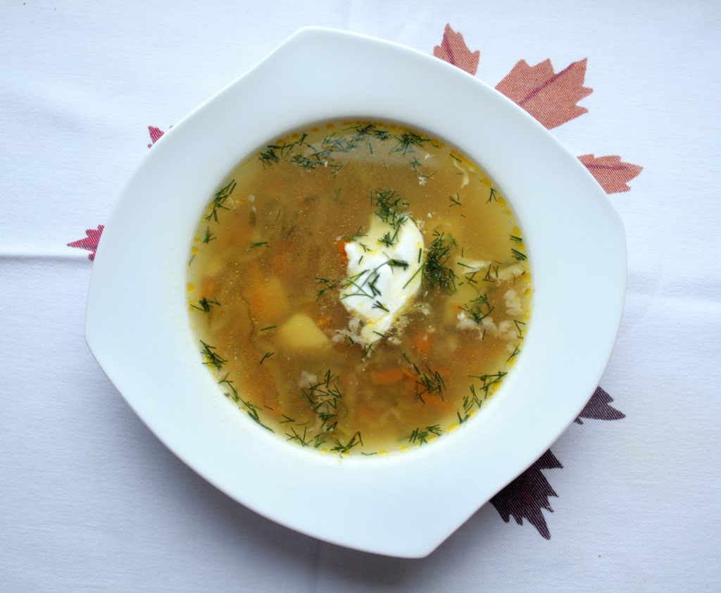 Polish cucumber low FODMAP soup, served with lactose free sour cream and fresh dill.