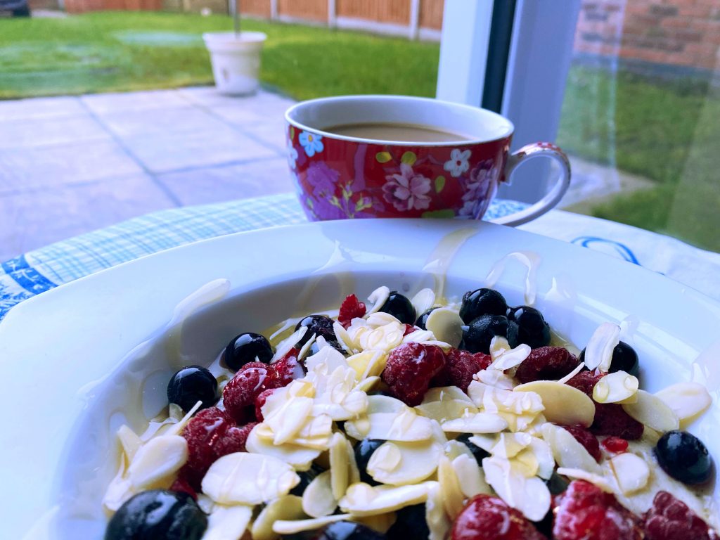 Low FODMAP porridge with berries, garden